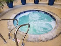 Outdoor pool and hot tub area